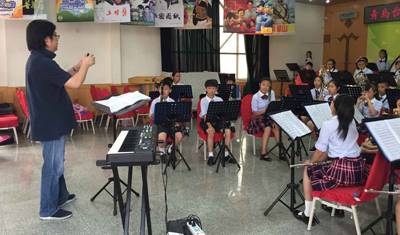 腾博官网示范乐团青岛台东六路小学管乐团大师班活动成功举办