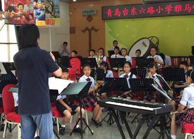 腾博官网示范乐团青岛台东六路小学管乐团大师班活动成功举办